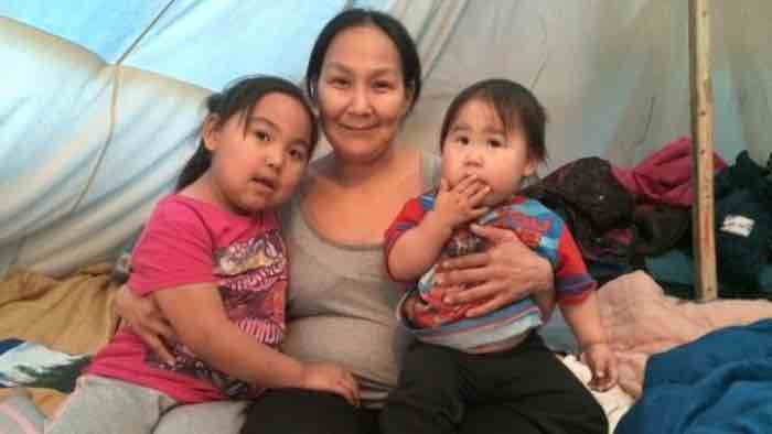 Alison Nakoolak with two of her children