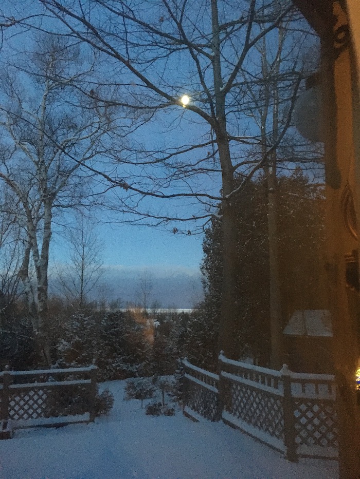 God’s silver moon setting over Lake Huron
