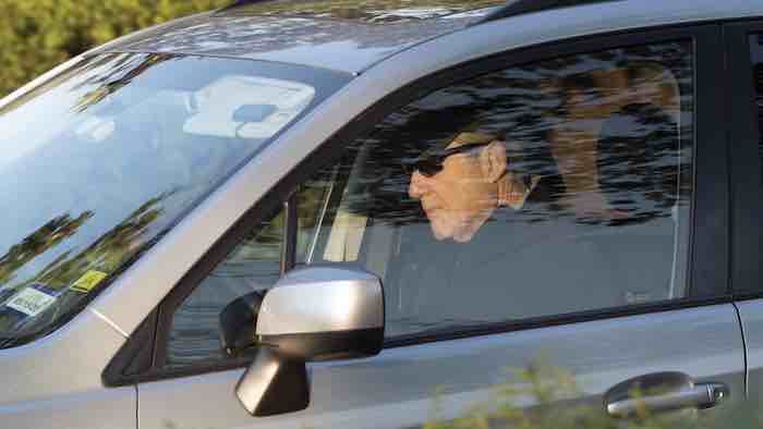 Special Counsel Robert Mueller drives away from his Washington home on Wednesday. Outstanding questions about the special counsel's Russia investigation have not stopped President Donald Trump and his allies from declaring victory. (AP Photo/Kevin Wolf)