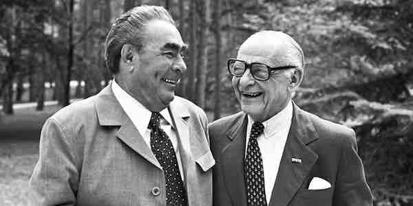 Leonid Brezhnev and Armand Hammer talk during a meeting.  Vladimir Musaelyan/TASS